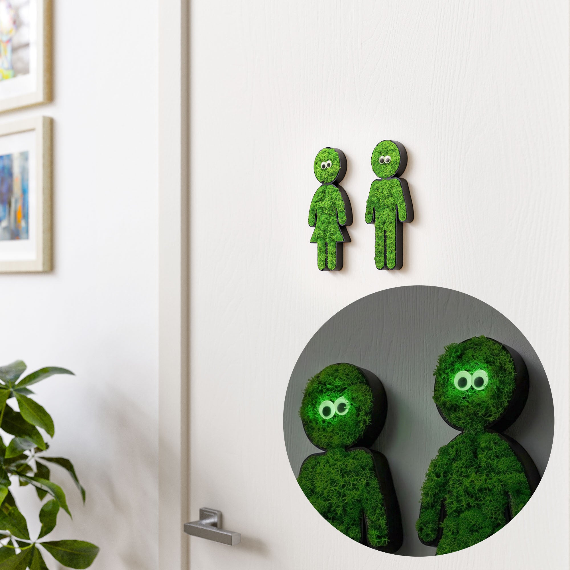 MOOSWERK Moosfigur mit leuchtenden Augen "Glow-Buddy" | Modernes Piktogramm Schwarz aus Islandmoos | Witzige Wanddeko für Flur, WC & Toilette