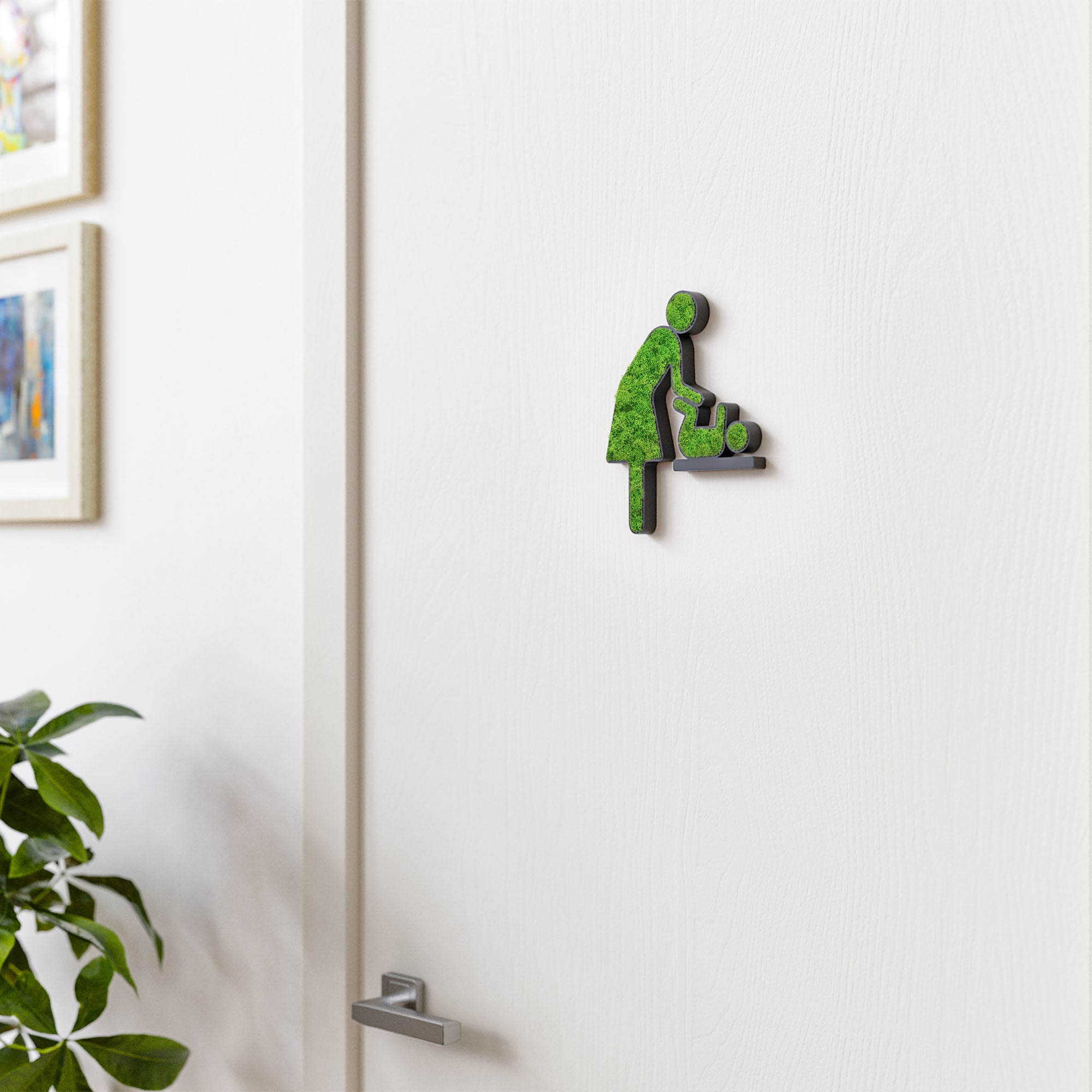 MOOSWERK Moss Door Sign Changing Room Pictogram (Woman &amp; Baby) – Handmade sign with real moss in a black frame