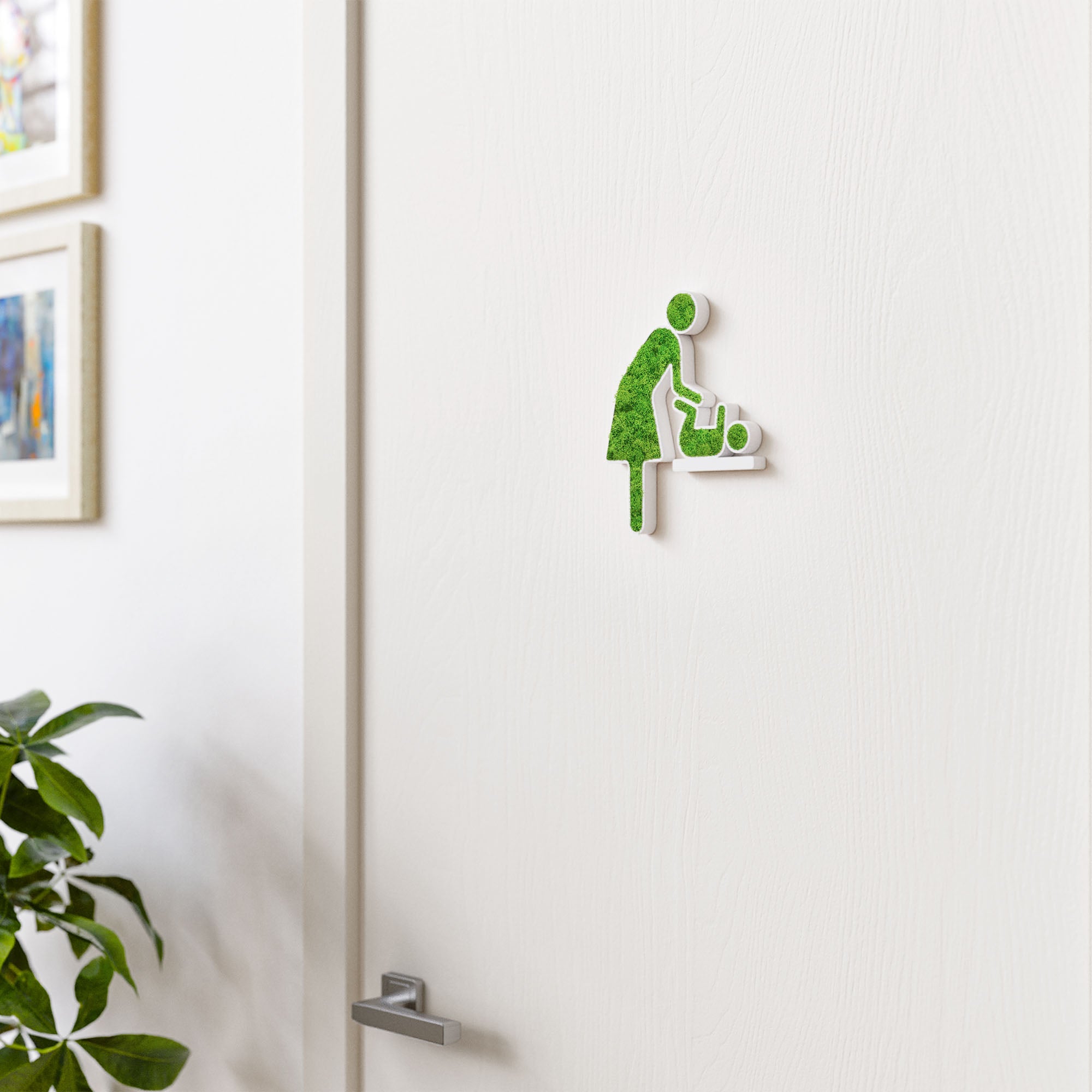 MOOSWERK Moss Door Sign Changing Room Pictogram (Woman &amp; Baby) – Handmade sign with real moss in a white frame